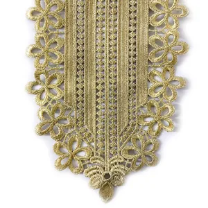 Detailed view of gold embroidered lace floral appliqué for DIY garment necklines.