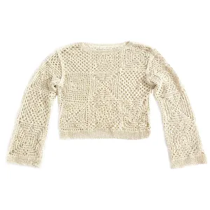 Detail view of cream crochet long-sleeve knit crop top with hollow square pattern