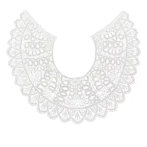 Detail of intricate milk silk embroidery on a white lace doll collar accessory