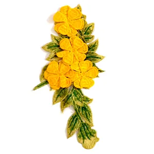 Exquisite macro detail of yellow 3D floral embroidery patch applique with green leaves