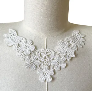 Close-up of white 3D floral lace embroidery faux collar for DIY children's clothing