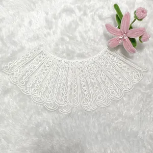 Detail shot of white rope embroidery lace faux collar for garments and DIY crafts.