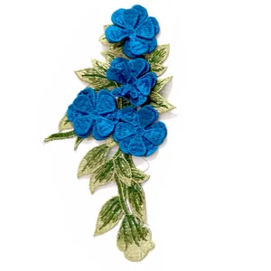 Macro view showing the intricate 3D embroidered details of this blue floral lace patch