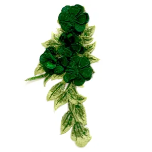 Detailed macro view of 3D multilayer green floral embroidery lace patch for DIY craft