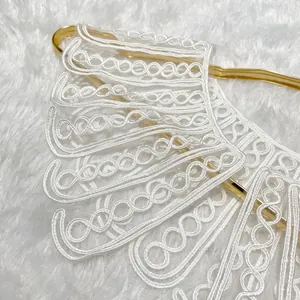 Close-up detail of intricate rope embroidery on elegant white lace mesh fake collar