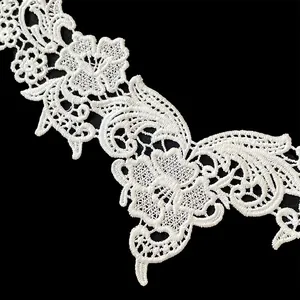 Close-up of white milk silk embroidered floral lace trim for DIY garment accessories