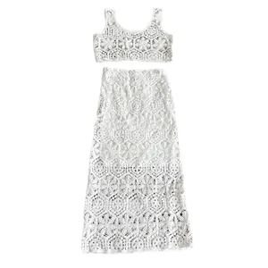 Detail view showing intricate white crochet lace texture of two-piece summer set