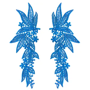 Detailed view of symmetrical blue polyester lace floral embroidery patches for clothing