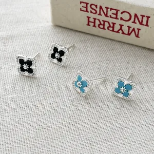 Elegant s925 silver diamond-shaped earrings with four-leaf clover and micro-pavé crystals.
