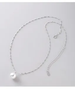 Elegant 925 sterling silver necklace featuring a round white pearl pendant detail