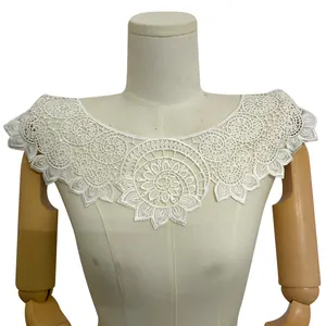 Detailed view of the intricate white embroidered lace hollow false collar pattern