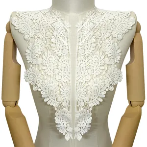 Close-up of white milk silk embroidered lace collar with hollow water-soluble pattern