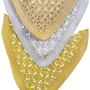 Close-up of gold and silver metallic hollow embroidery lace patches for shoe decoration