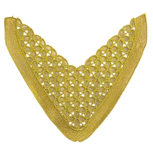 Detailed view of gold thread embroidered hollow lace pattern for shoe decor