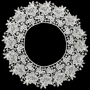 Macro view of white milk silk embroidered lace doll collar with hollow floral design