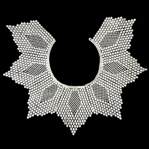 Detailed view of a white milk silk embroidered lace detachable doll collar with hollow pattern.