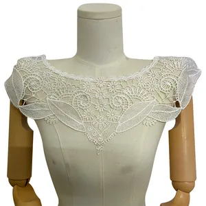 Detailed view of elegant white polyester embroidered lace fake collar on dress form