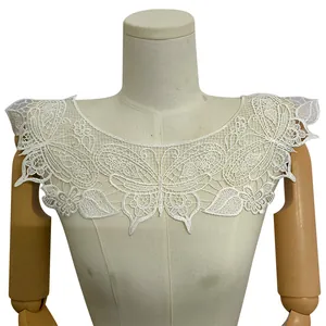 Detailed view of white hollow-out butterfly embroidery lace collar on mannequin
