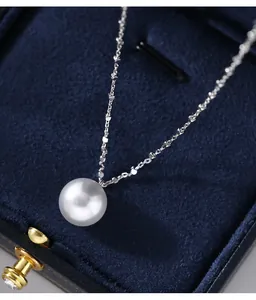 Detailed close-up of a 925 sterling silver necklace with a lustrous round white pearl