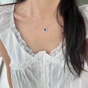 Elegant S925 sterling silver necklace with a rectangular diamond-set letter pendant