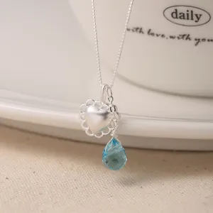 Elegant S925 sterling silver necklace featuring a matte heart and blue waterdrop pendant