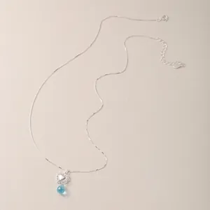 S925 silver necklace with matte heart and light blue water drop pendant detail.
