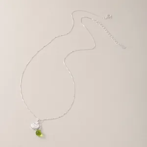 Elegant S925 silver necklace with apple charm and green faceted drop bead