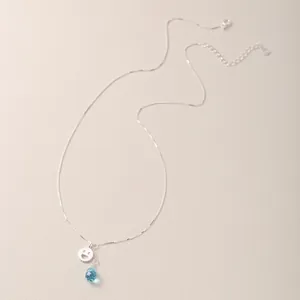 Collana minimalista in argento S925 con faccina sorridente e ciondolo a goccia blu