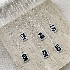 Elegant S925 sterling silver initial necklace with diamond-encrusted rectangular pendant