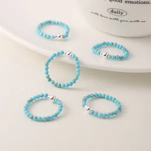 Handmade elastic turquoise bead rings with s925 silver gourd charms in minimalist style