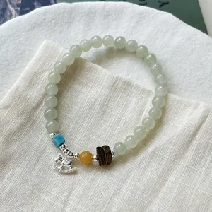 Eleganter 925er Sterlingsilber Schaukelpferd Armband mit Hetian Jade und Bernstein