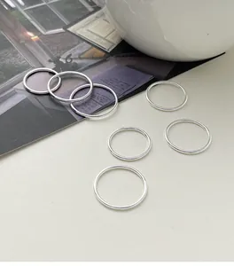 Detailed view of 6 minimalist 999 sterling silver polished plain band rings for women