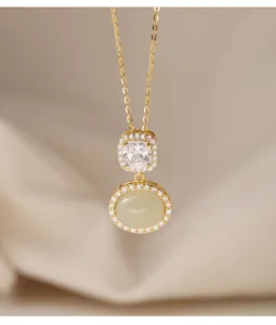 Detailed view of s925 gold-plated necklace with elegant Hetian jade and cubic zirconia