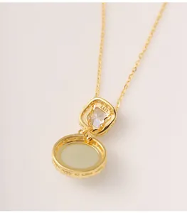 Back view of gold-plated S925 silver necklace with oval Hetian jade pendant