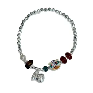 Handmade S925 silver beaded elastic bracelet featuring lion dance and fortune bag charms.