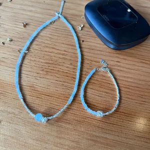 Close-up detail of 925 sterling silver aquamarine beaded necklace and bracelet set