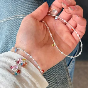 Detail view of 925 sterling silver necklace with colorful round zircon stones and beads