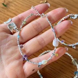 Detail showing handmade 925 silver bracelet with irregular crystals and pearls