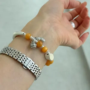 999 sterling zilveren kralenarmband met honing amber en een gelukkige pinda hanger