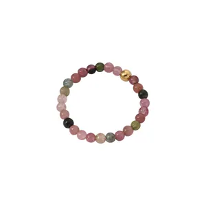 Handmade multicolored tourmaline beaded ring with a gold sterling silver accent bead