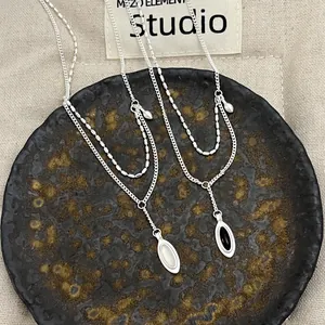 Double layer 925 sterling silver necklace with oval black onyx and white chalcedony