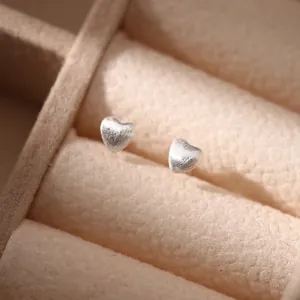 Minimalist 990 sterling silver matte heart stud earrings in shiny silver finish