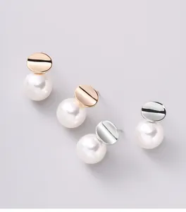 Minimalist elegant irregular metal disc and white pearl stud earrings in gold and silver