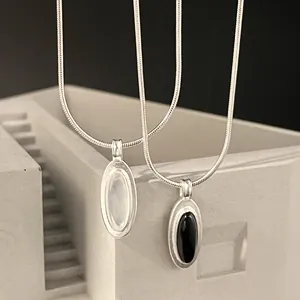 925 sterling silver snake chain necklace with oval black onyx and white chalcedony pendants