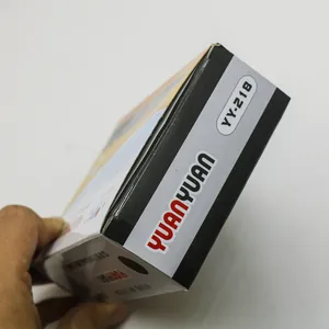 Close-up detail of YUANYUAN YY-218 permanent marker pen packaging for shipping and office use