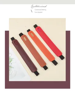 Detailed close-up view of elastic PU leather pen sleeves in brown, orange, and red tones