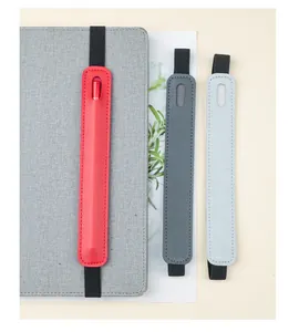 Detail view of colorful PU leather single pen holders with elastic strap for notebooks