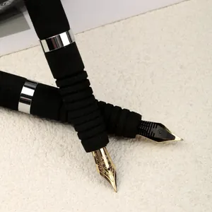 Professional business matte black metal fountain pen with premium gold and black nib detail
