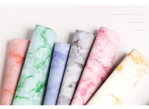 Detailed view of assorted marble pattern PU leather pen sleeves in various colors