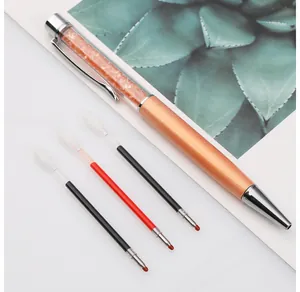 Detail of rose gold crystal ballpoint pen with three ink refills